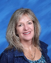 A close-up of a person smilingDescription automatically generated